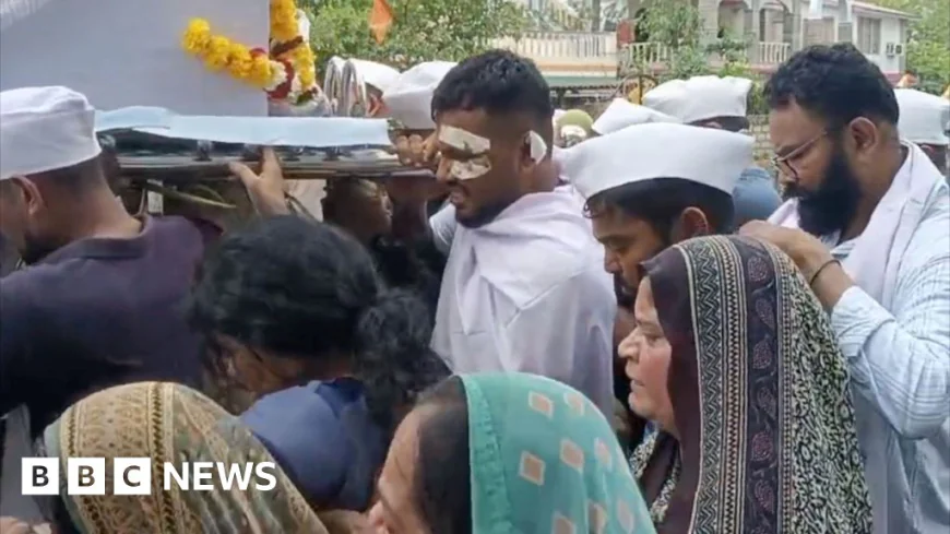 Lone Air India survivor carries coffin of brother killed in crash