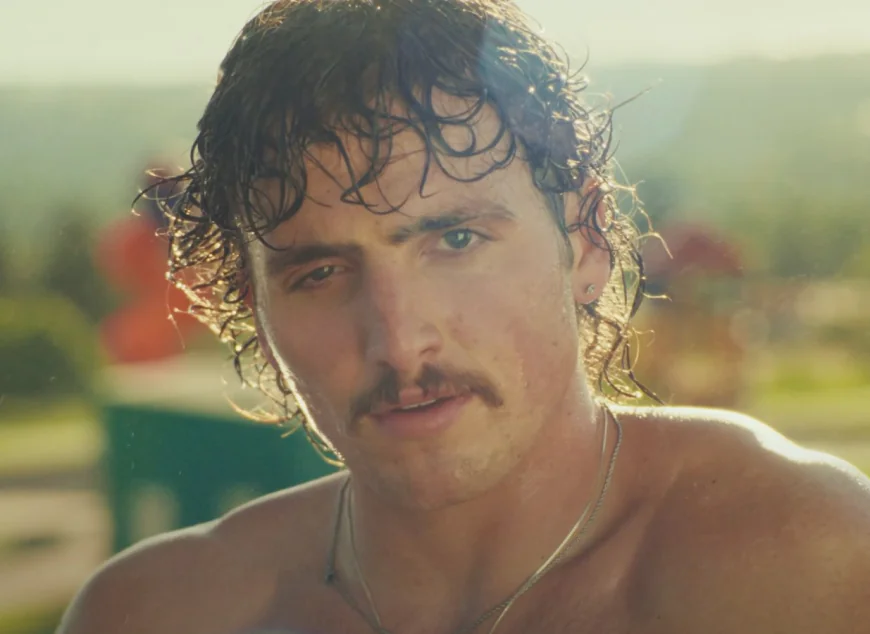 Benson Boone Is a Topless Car Washer in ‘Mr. Electric Blue’ Video